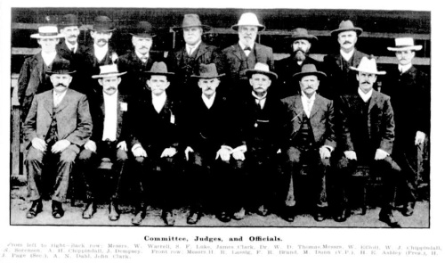 Hermann Lassig, posing with 15 other committee members, judges and officials at the Bundaberg Show, June 1907 (click to embiggen)